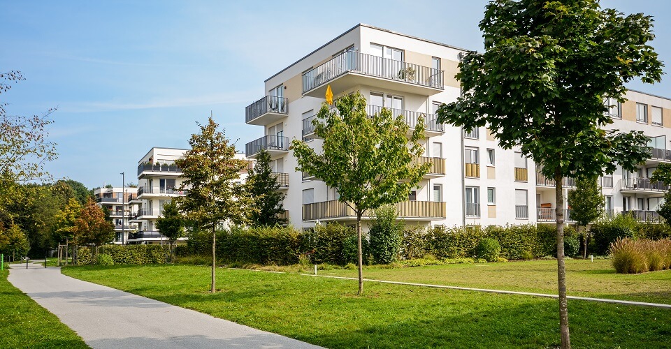 A building with a yard with grass