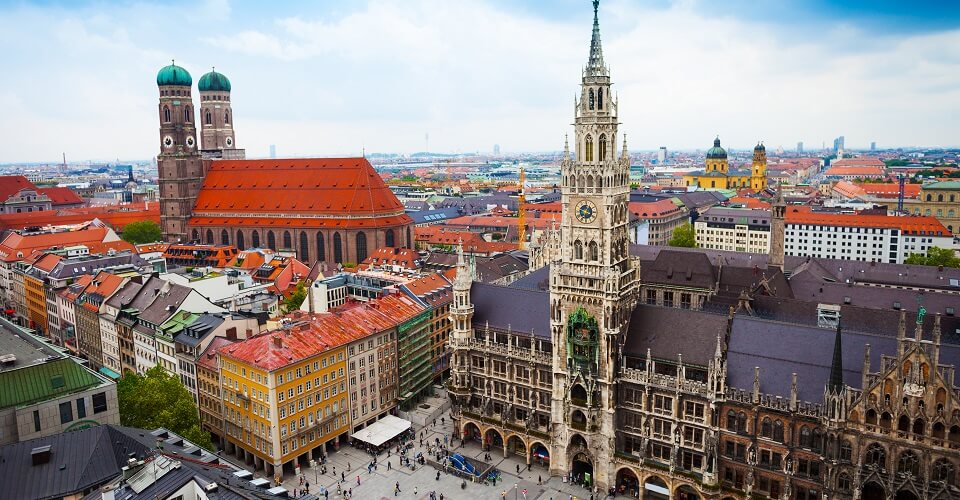 beautiful city centre view of Marienplatz, New Town Hall (Neues Rathaus), Glockenspiel, Frauenkirche with sky in Munich, (Bavaria, Germany)